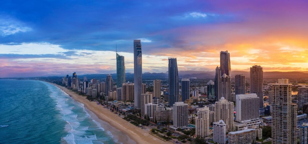 Gold Coast skyline and beach surrounded by the beautiful hues of sunset